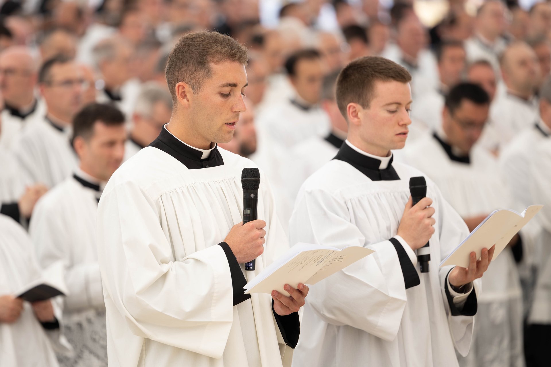 Seminarians chant the litany of the saints …